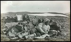 Image of Polar Eskimo [Inughuit] Reclining by Rock Foundation